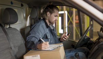 medium-shot-man-sitting-car